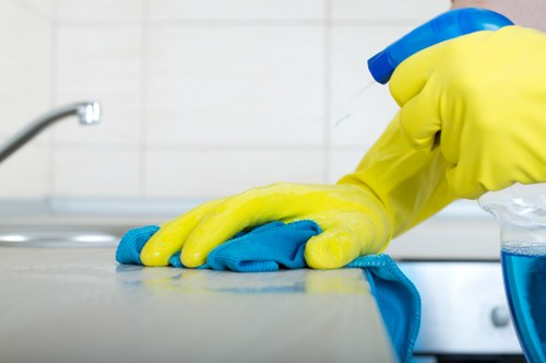 Commercial cleaner vacuuming a modern office in SE5