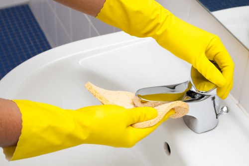 Carpet cleaning staff carrying out a risk-assessed cleaning job with PPE
